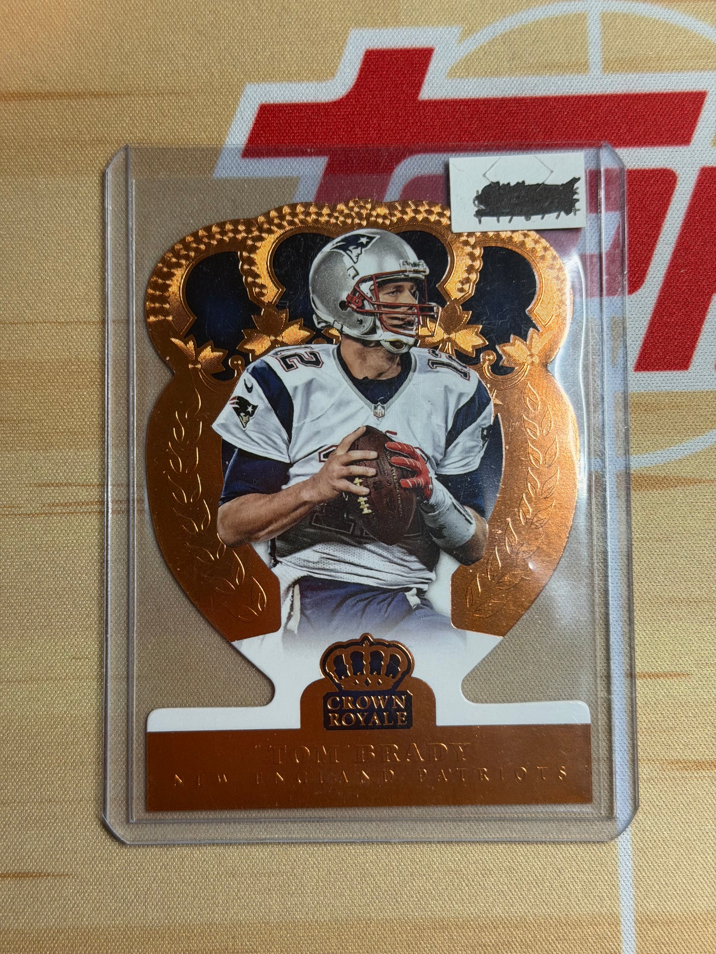 14 TOM BRADY CROWN ROYALE FOOTBALL BRONZE DIE CUT