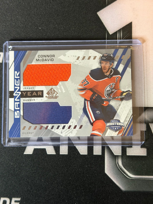 21-22 SP GAME USED BANNER YEAR CONNOR MCDAVID DUAL JERSEY